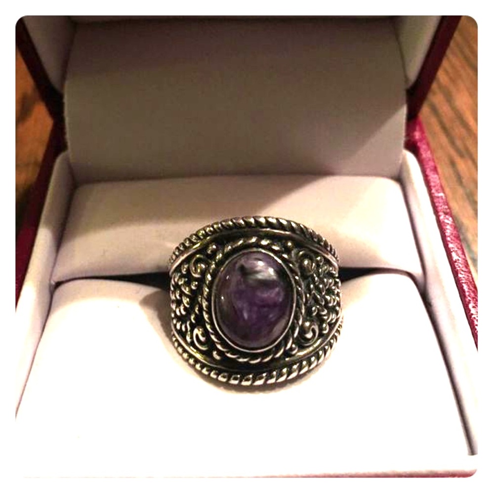 Stamped sterling silver ring. Purple lapis stone.